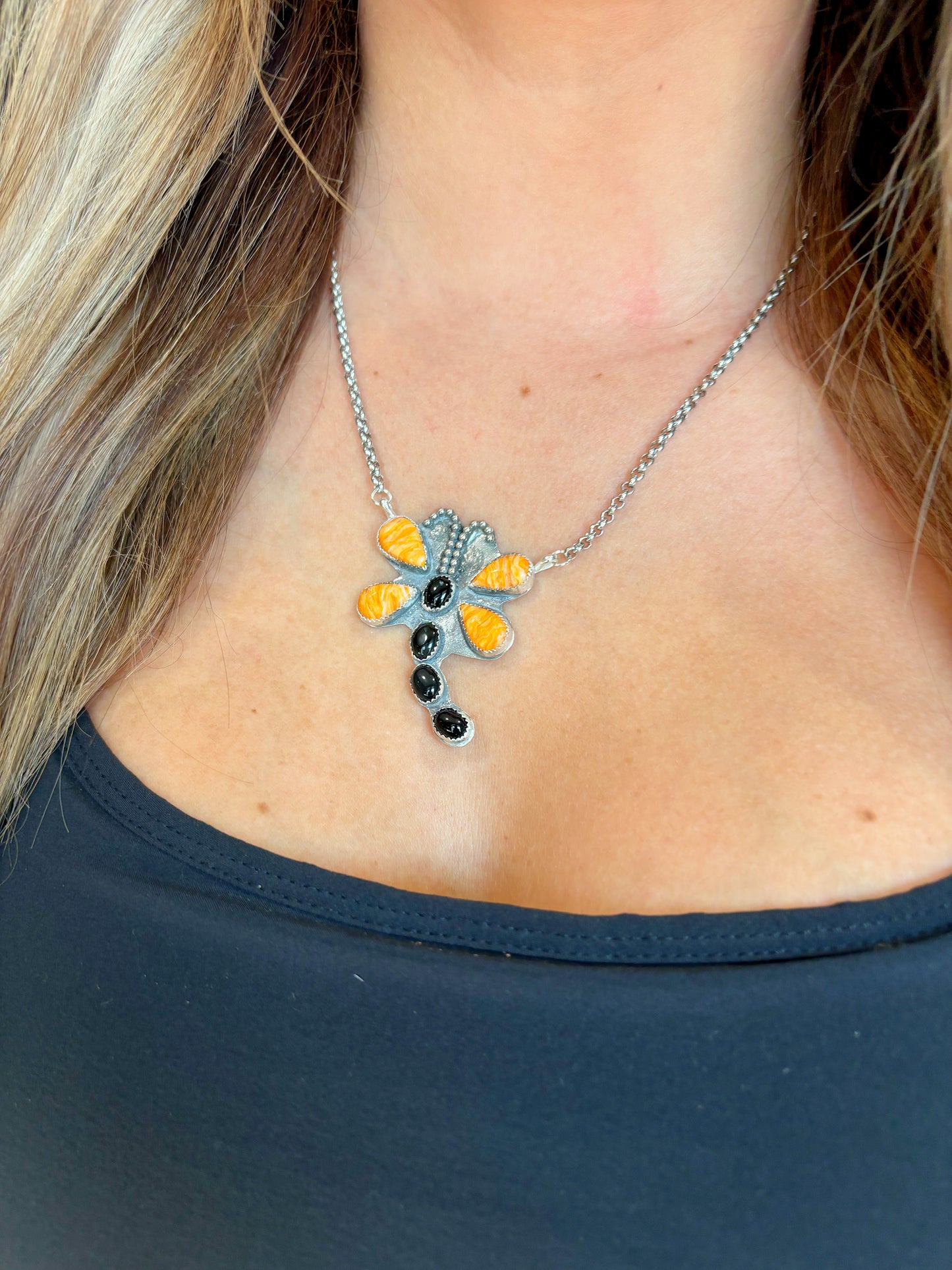 Orange spiny and black onyx dragonfly
